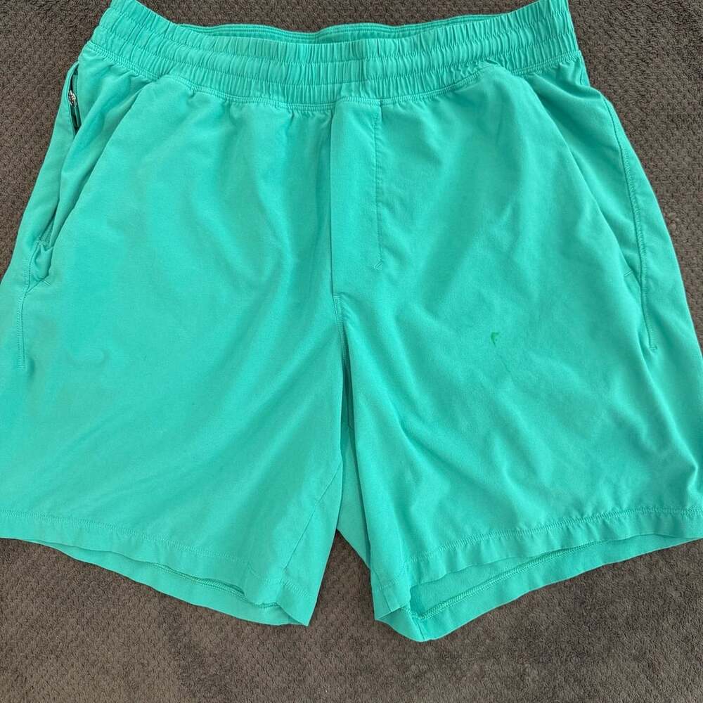 Lululemon Athletic Shorts Green men's size medium athletic shorts. 7" Inseam